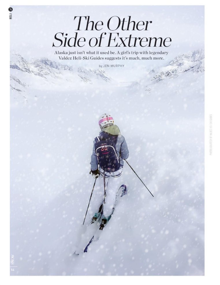 A skier descending through falling snow in Alaska - SNOW Magazine, The Other Side of Extreme