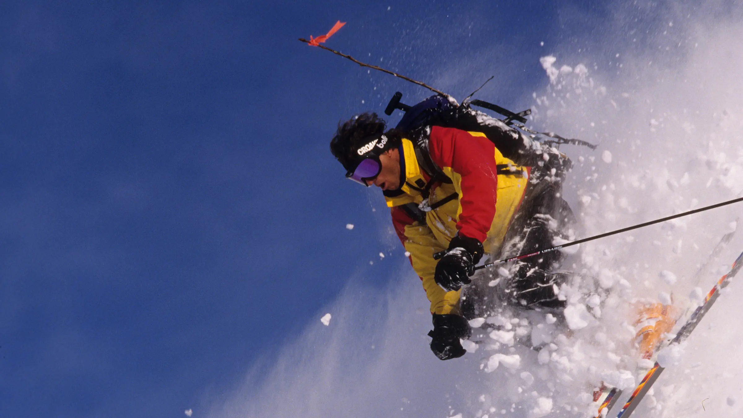 Doug Coombs, founder of Valdez Heli-Ski Guides, skiing deep powder in the Chugach Mountains, Alaska