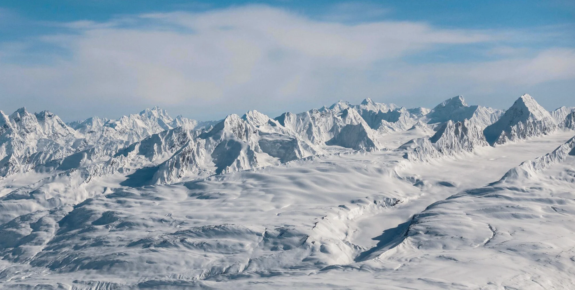 Snow-loaded spine walls in champagne powder, Chugach Mountains, Thompson Pass, Alaska