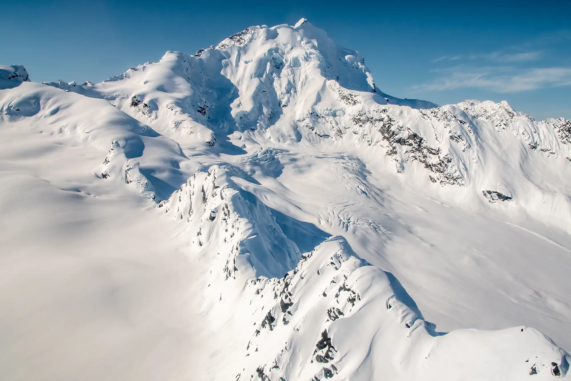 Sweeping view of steep peaks and glaciers in the Chugach Mountains near Valdez, Alaska