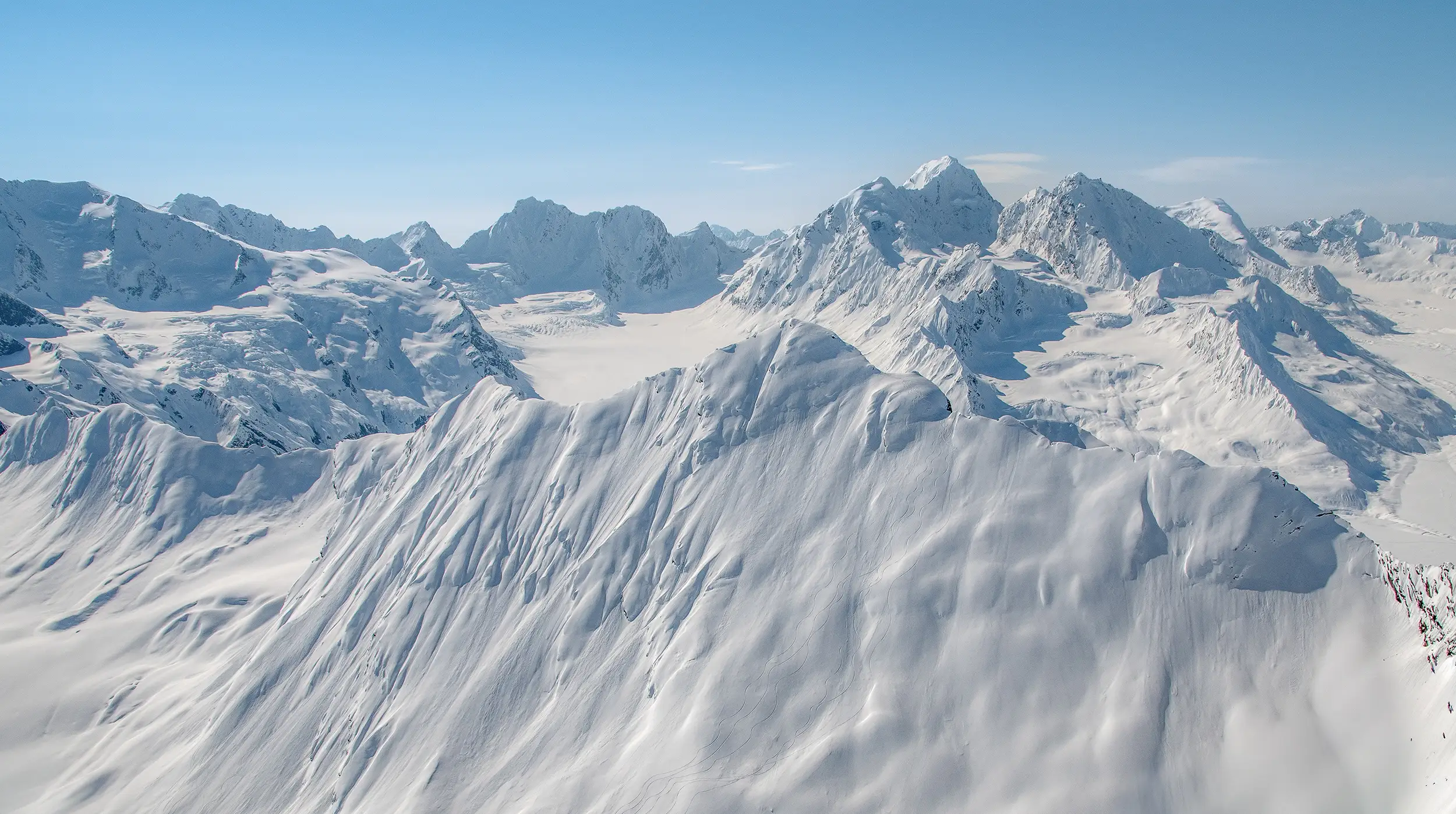 Aerial panorama of the Chugach Mountains above Thompson Pass, Valdez, Alaska - widely regarded as the best heli-skiing terrain in the world