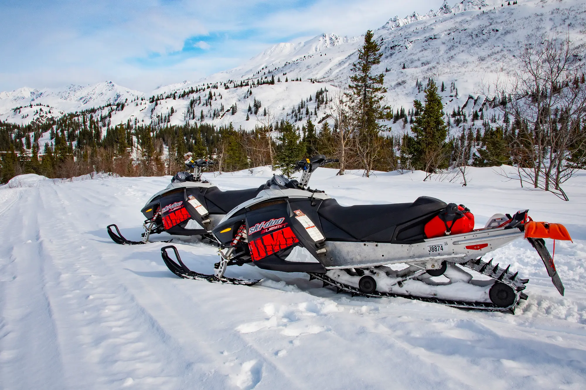 Snowmobiling through fresh snow near Valdez, Alaska
