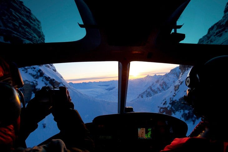View from the helicopter flying home after a day of heli-skiing in the Chugach Mountains