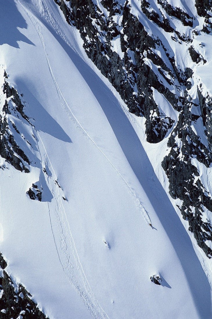 Gordy Peiffer skiing a large ramp at full speed in Valdez, Alaska