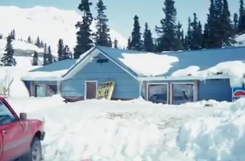 Old Tsaina Lodge covered with snow in winter